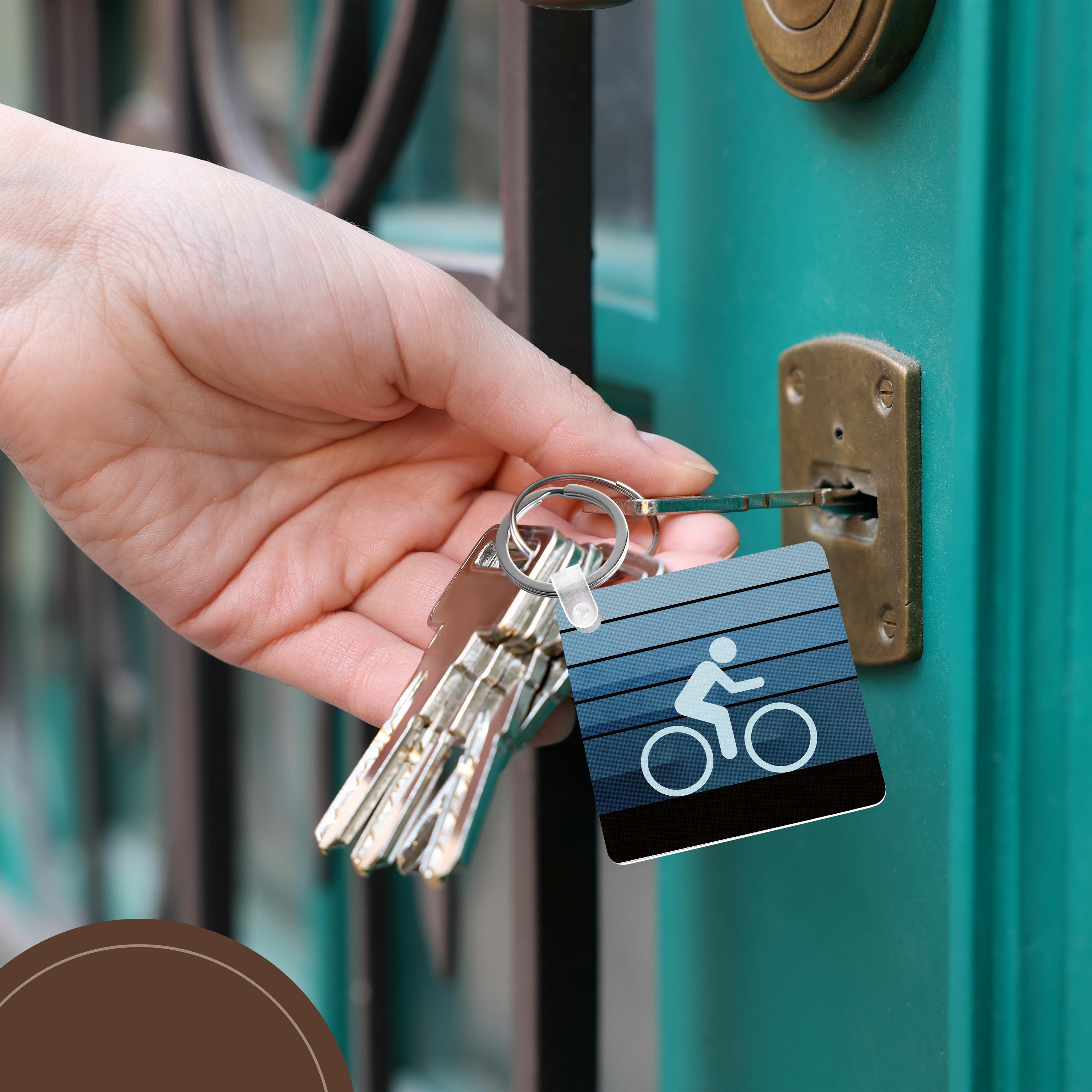 Key Chain - Let It Roll - bicycling icon with grunge texture and colorful blue gradient layers Designs Summertime