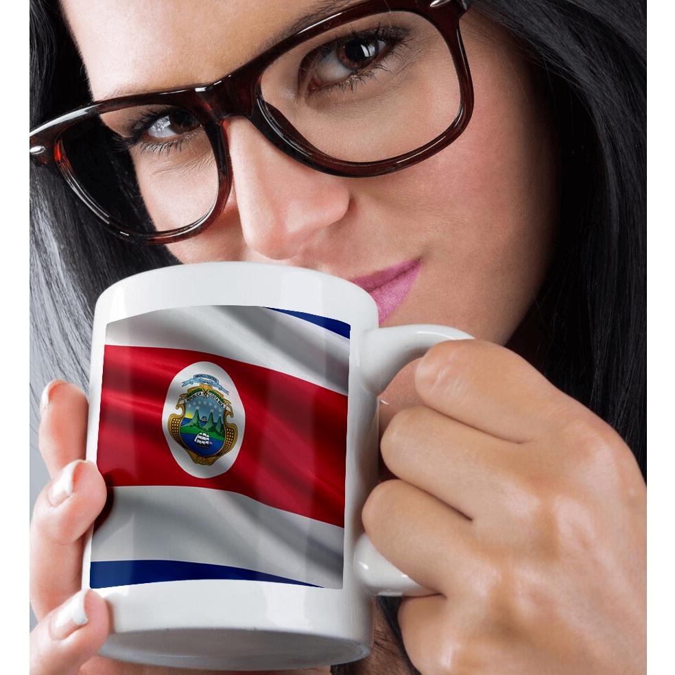 3dRose Carsten Reisinger - Illustrations - Flag of Costa Rica waving in the wind - Mugs (mug_178745)